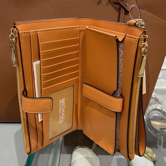 MICHAEL KORS JST LG DOUBLE ZIP WRISTLET WALLET PHONE HOLDER 
CIDER
NWT - Picture 7 of 16